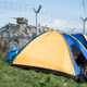 Mar. 2, 2016 – Idomeni, Greece. A Macedonian armored vehicle drives along the border fence.